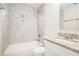 Updated bathroom with granite countertop and tile shower/tub combo at 3212 Ward Sw Dr, Atlanta, GA 30354