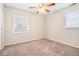 Spacious bedroom with ceiling fan, carpet, and window blinds at 3212 Ward Sw Dr, Atlanta, GA 30354
