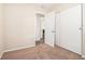 Bedroom with neutral carpeting and ample closet space at 3212 Ward Sw Dr, Atlanta, GA 30354