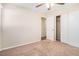 Bedroom with ceiling fan, closet, and door to bathroom at 3212 Ward Sw Dr, Atlanta, GA 30354