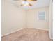 Bright bedroom with ceiling fan and neutral carpeting at 3212 Ward Sw Dr, Atlanta, GA 30354