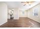 Open concept dining area with wood-look floors, and kitchen access at 3212 Ward Sw Dr, Atlanta, GA 30354