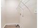 Laundry closet with shelving and hookups for washer and dryer at 3212 Ward Sw Dr, Atlanta, GA 30354