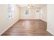 Bright living room featuring hardwood floors and a ceiling fan at 3212 Ward Sw Dr, Atlanta, GA 30354