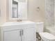 Bathroom boasts a white vanity and marble tile at 5063 S Woodbridge Trl, Stone Mountain, GA 30088