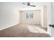 Spacious bedroom with neutral carpeting and ceiling fan at 5063 S Woodbridge Trl, Stone Mountain, GA 30088