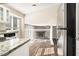 Modern kitchen features granite countertops and stainless steel appliances at 5063 S Woodbridge Trl, Stone Mountain, GA 30088
