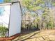 Private backyard with wooded area and chain link fence at 2655 Brandenberry Dr, Decatur, GA 30034