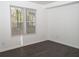 Spacious bedroom with gray vinyl plank flooring and a large window at 2655 Brandenberry Dr, Decatur, GA 30034