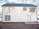 Rear view of the house, showcasing white siding and a patio at 2655 Brandenberry Dr, Decatur, GA 30034