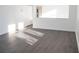 Bright living room with gray vinyl plank flooring and lots of natural light at 2655 Brandenberry Dr, Decatur, GA 30034