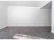 Bright living room featuring neutral walls and gray vinyl flooring at 2655 Brandenberry Dr, Decatur, GA 30034