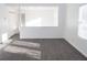 Bright living room with gray vinyl plank flooring and lots of natural light at 2655 Brandenberry Dr, Decatur, GA 30034