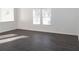 Bright living room with gray vinyl plank flooring and lots of natural light at 2655 Brandenberry Dr, Decatur, GA 30034