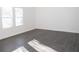 Bright living room with gray vinyl plank flooring and lots of natural light at 2655 Brandenberry Dr, Decatur, GA 30034