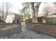 Backyard with a large tree and back deck at 147 Bowen Sw Cir, Atlanta, GA 30315