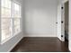 Bright bedroom with a large window offering a view and hardwood floors at 147 Bowen Sw Cir, Atlanta, GA 30315