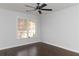 Bright bedroom with large windows and dark hardwood floors, providing a comfortable and stylish space at 147 Bowen Sw Cir, Atlanta, GA 30315