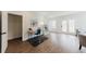 Open concept room with an office, french doors, and natural light at 147 Bowen Sw Cir, Atlanta, GA 30315