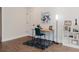 Bright office with wood desk, teal chair, stylish decor, and a fluffy rug at 147 Bowen Sw Cir, Atlanta, GA 30315