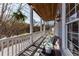 Relaxing covered porch with chairs, wood ceiling and scenic views at 147 Bowen Sw Cir, Atlanta, GA 30315