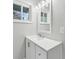 Clean bathroom with updated vanity and mirror at 2592 Baker Nw Rd, Atlanta, GA 30318