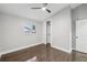 Well-lit bedroom, hardwood floors, and a closet at 2592 Baker Nw Rd, Atlanta, GA 30318