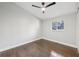 Spacious bedroom with hardwood floors and ceiling fan at 2592 Baker Nw Rd, Atlanta, GA 30318