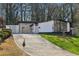 Charming ranch home with updated facade and spacious driveway at 2592 Baker Nw Rd, Atlanta, GA 30318