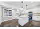 Modern kitchen with white cabinets and granite countertops at 2592 Baker Nw Rd, Atlanta, GA 30318