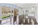 Open concept living and kitchen area with hardwood floors at 2592 Baker Nw Rd, Atlanta, GA 30318
