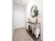 Inviting foyer with stylish decor, a decorative mirror, and light wood-look flooring at 257 Whitetail Cir, Canton, GA 30115