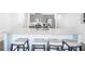 Kitchen island with granite countertops and barstool seating and stainless steel appliances at 257 Whitetail Cir, Canton, GA 30115