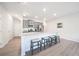 Modern kitchen with stainless steel appliances and a large island with seating at 257 Whitetail Cir, Canton, GA 30115