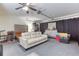Finished basement includes a white couch and a bed in a spacious layout at 4541 Old Highway 138 Sw, Loganville, GA 30052