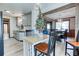 Open concept with kitchen, breakfast nook, and dining area; decorative tree on breakfast table at 4541 Old Highway 138 Sw, Loganville, GA 30052