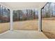 Covered porch with white columns, perfect for outdoor relaxing and entertaining at 291 Martin Spring Rd, Lawrenceville, GA 30045