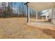 Spacious backyard with a covered porch, ideal for outdoor activities and relaxation at 291 Martin Spring Rd, Lawrenceville, GA 30045