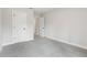 Spacious bedroom features neutral walls and plush carpeting, creating a comfortable and inviting space at 291 Martin Spring Rd, Lawrenceville, GA 30045