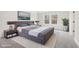 Modern main bedroom featuring stylish furniture and bright, sunny windows at 291 Martin Spring Rd, Lawrenceville, GA 30045