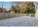Large back deck with white paint and wooden railing overlooking tree-filled backyard at 1751 Nathan Ln, Austell, GA 30168