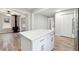 Kitchen featuring white cabinets, stainless steel appliances, and center island at 1751 Nathan Ln, Austell, GA 30168