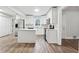 Kitchen featuring white cabinets, stainless steel appliances, and center island at 1751 Nathan Ln, Austell, GA 30168