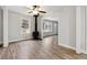 Living room featuring hardwood floors, fireplace, and natural light at 1751 Nathan Ln, Austell, GA 30168