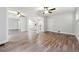 Spacious living room features hardwood floors, ceiling fans and neutral paint at 1751 Nathan Ln, Austell, GA 30168