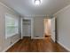 Well-lit bedroom with hardwood floors and closet at 3147 Canary Ct, Decatur, GA 30032