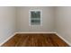Simple bedroom with hardwood floors and a window at 3147 Canary Ct, Decatur, GA 30032