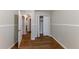 Bedroom with hardwood floors and access to the hallway at 3147 Canary Ct, Decatur, GA 30032