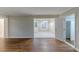 Bright dining room with hardwood floors and access to the kitchen at 3147 Canary Ct, Decatur, GA 30032