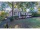 Light pink house with a tree-lined front yard at 3147 Canary Ct, Decatur, GA 30032